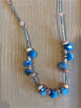 Faceted stone necklace possibly sapphires and quartz silver tone clasp.